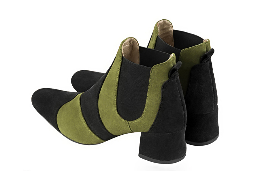 French elegance and refinement for these matt black and pistachio green dress two-tone booties, with elastics on the sides, 
                available in many subtle leather and colour combinations. Customise with your own colours and materials from the "My Favourites" page
This pretty boot with its elasticated sides is easy to put on. 
Its original cut will amuse your steps and will enhance your basic outfits.
  
                Matching clutches for parties, ceremonies and weddings.   
                You can customize these ankle boots with elastics to perfectly match your tastes or needs, and have a unique model.  
                Choice of leathers, colours, knots and heels. 
                Wide range of materials and shades carefully chosen.  
                Rich collection of flat, low, mid and high heels.  
                Small and large shoe sizes - Florence KOOIJMAN
